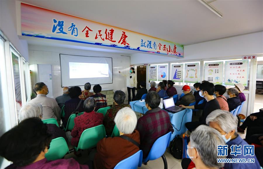 （新華全媒頭條·兩會精神看落實·圖文互動）（3）整體謀劃、系統(tǒng)升級、全面提升——落實全國兩會精神織牢織密公共衛(wèi)生防護網(wǎng)