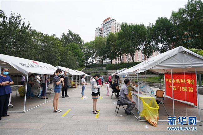 （新華全媒頭條·圖文互動(dòng)）（5）首都再戰(zhàn)“疫”，難忘40天——寫在北京應(yīng)急響應(yīng)級(jí)別降級(jí)之際 